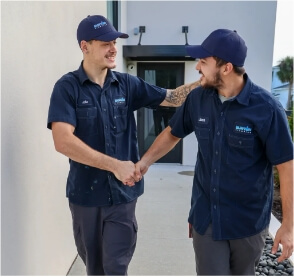 two-technicians-shaking-hands